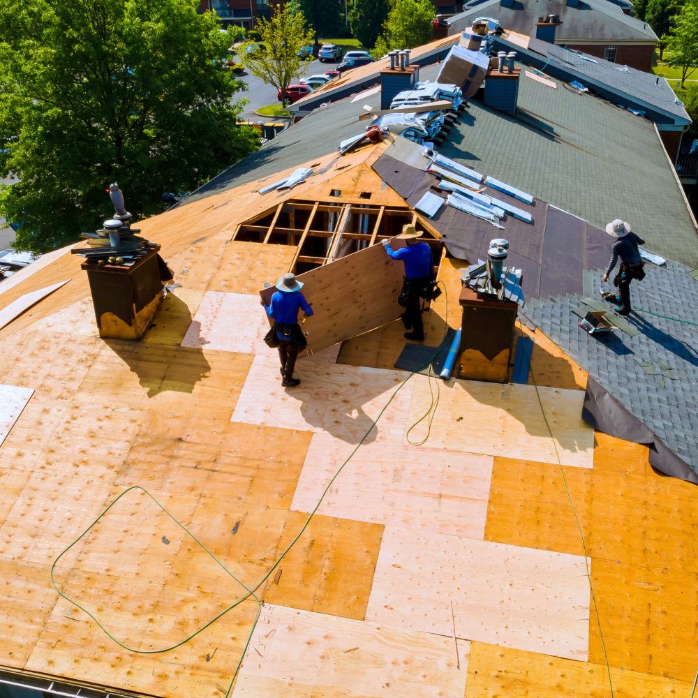 Replace old asphalt bitumen shingles on house roof in order to repair roof